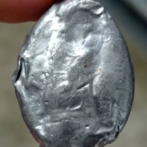 Alternative view of เบี้ยแก้ ยุคต้น หลวงพ่อเจริญ ฐานยุตโต วัดโนนสว่าง จังหวัดอุดรธานี