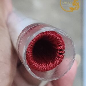 Alternative view of ตะกรุดมหาตันหลวง ปี 2542 เนื้อฝาบาตร หลวงพ่อเจริญ ฐานยุตโต วัดโนนสว่าง จังหวัดอุดรธานี